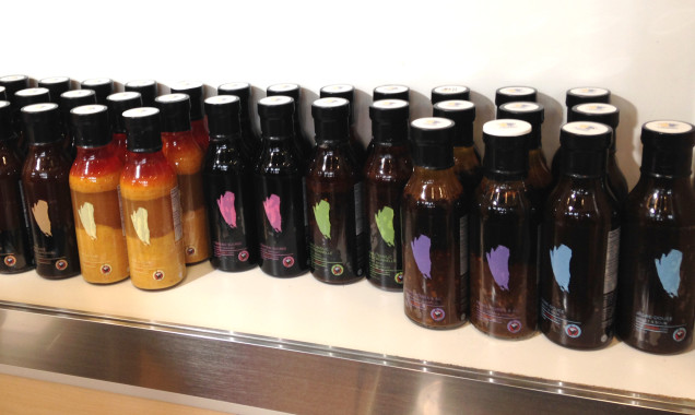 Bottles of Noobox Sauces designed by Kai Design displayed on the shelves