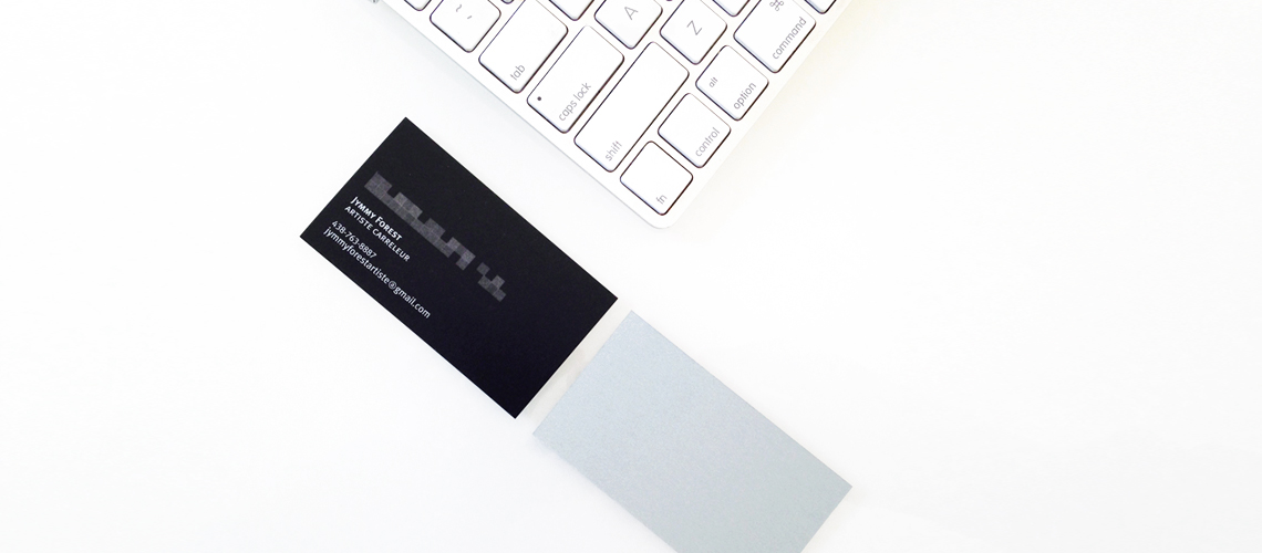 Geometric positoning of Jymmy Forest black and silver business card with wireless keyboard