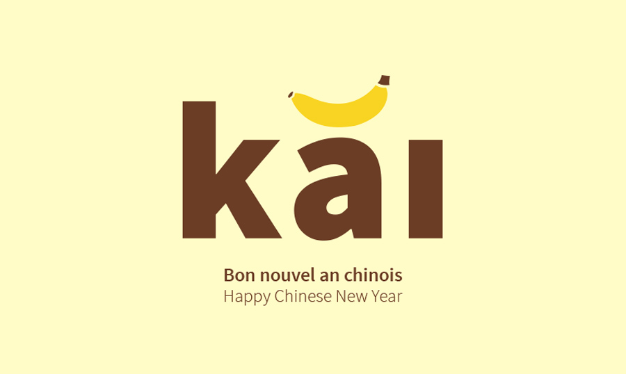 A yellow banana incoporated into Kai Design logo to refect the year of monkey for chinese new year celebration